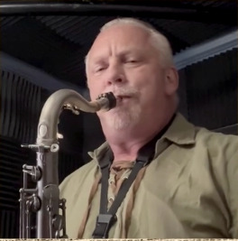 Drew Briney playing tenor saxophone